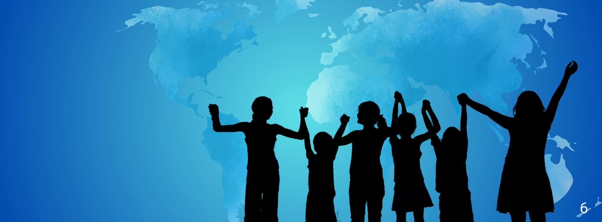 Silhouettes of children holding hands in front of a blue map background.