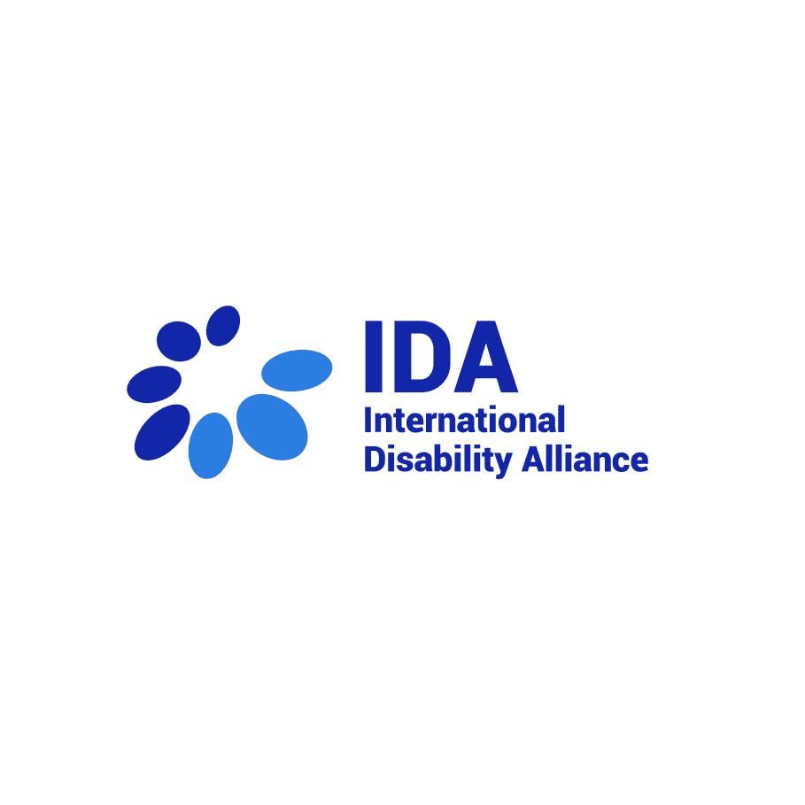 Logo of the International Disability Alliance featuring blue stylized petals in a circular formation, with "IDA" and "International Disability Alliance" written in blue text on a white background.